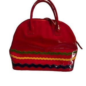 Sydie Lansing red patent purse.